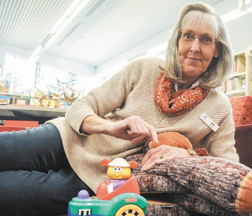 Library volunteer shares her love of reading with Hills children post image